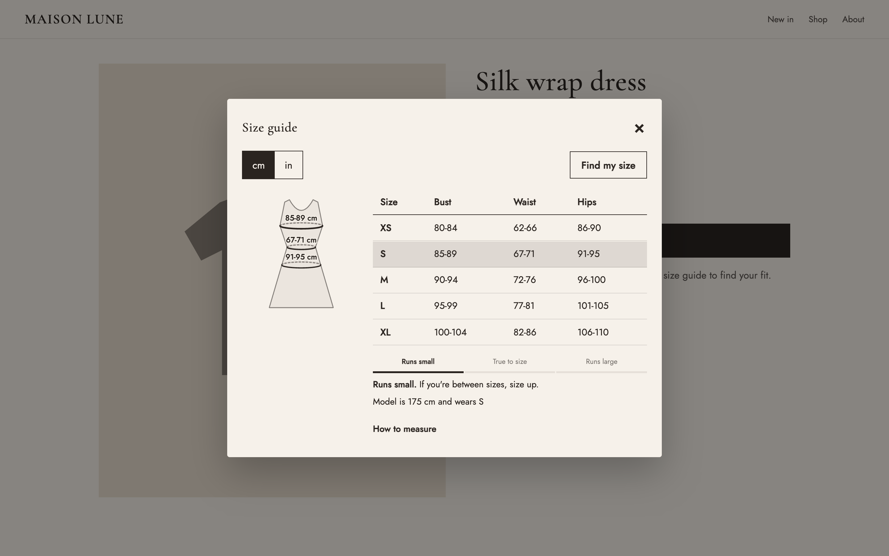 The Sizefolk size guide in the Maison Lune demo store, using that store's own colours, fonts and button shape